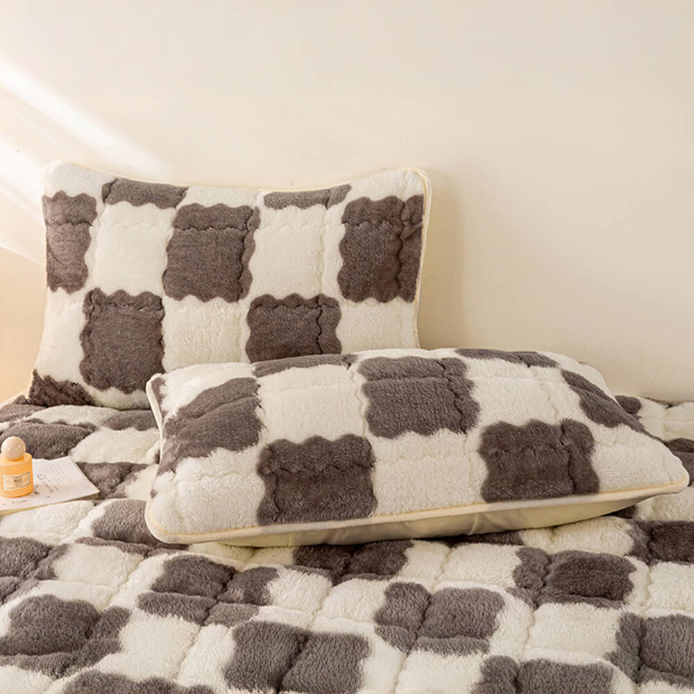 Surmatelas et taie d'oreiller en peluche à damier chaud